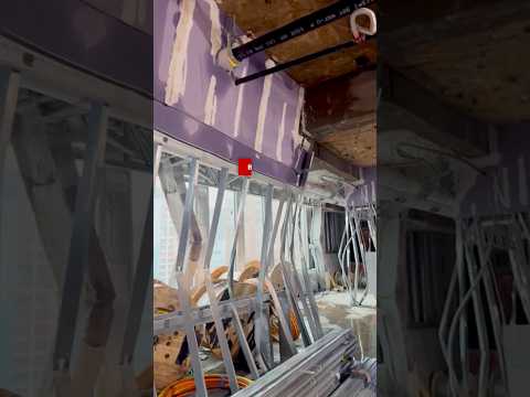 Buckled beams inside evacuated NYC high-rise