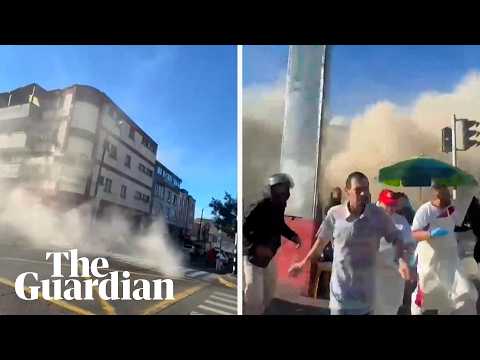 People flee as building collapses during earthquake in Colombia