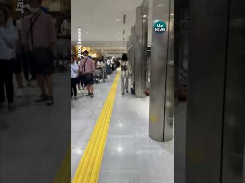At least four people have died and 400,000 residents evacuated after heavy rain in Tokyo