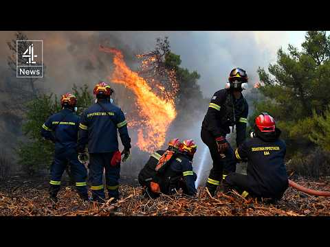 Two firefighting helicopters collide while tackling wildfires near Athens