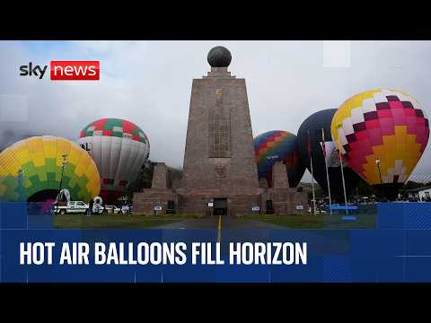 Hot air balloons fill sky above Ecuador