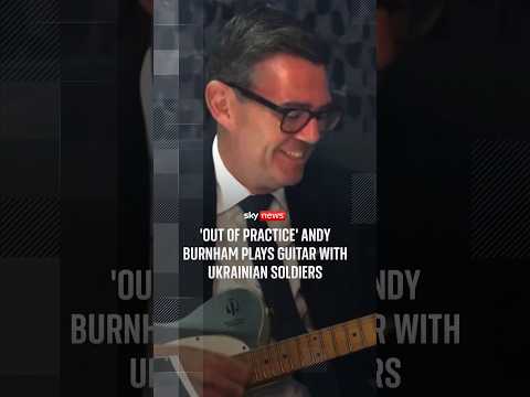 ‘Out of practice’ Burnham plays guitar with Ukrainian soldiers