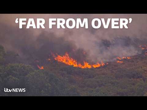 Watch as firefighters continue to battle devastating wildfires across Britain