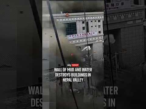 Wall of mud and water destroys buildings in Nepal valley