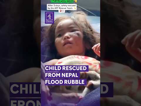 Young girl rescued from Nepal flood rubble