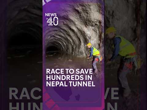 Rescuers race to reach 900 people trapped in Nepal flood tunnels