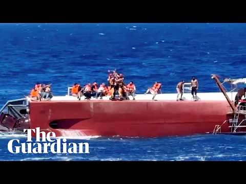 Helicopters and boats rescue passengers from capsized ferry in northern Cyprus