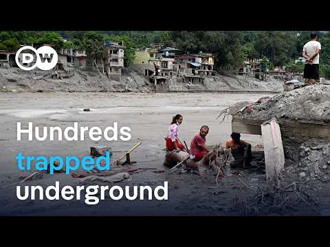 Hundreds trapped underground after Nepal flood disaster | DW News