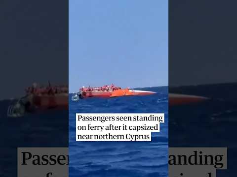 Passengers seen standing on ferry after it capsized near northern Cyprus