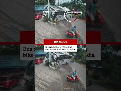 Bus crashes after avoiding bike collision in Kerala, India. #BBCNews