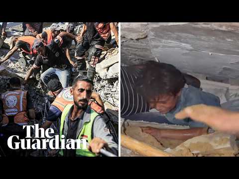 Emergency crews rush to free families from building collapse in Gaza