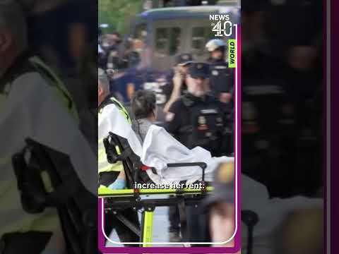 Police and protesters clash over eviction of 87-year-old in Madrid