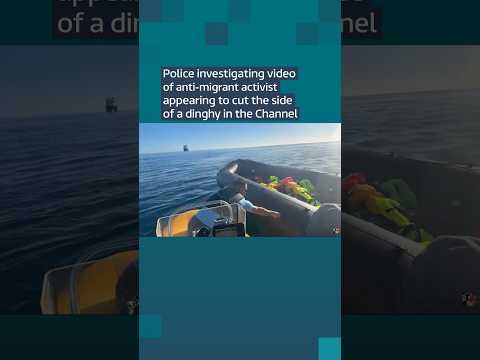 Police investigating video of anti-migrant activist appearing to cut the side of a dinghy
