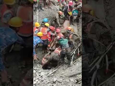 Two worker have been pulled alive from a tunnel nine days after devastating floods in Nepal.