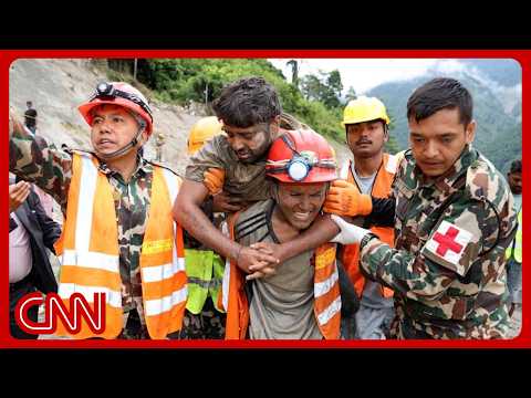 2 pulled alive from flooded Nepal tunnels, sparking hope for more rescues