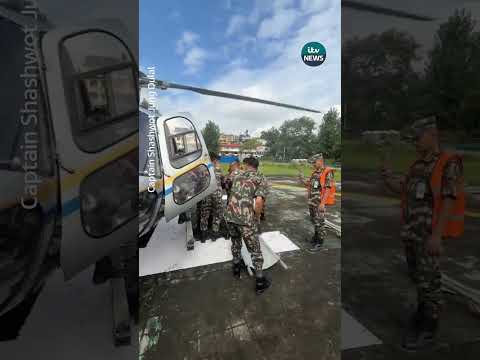Onboard footage captures flight after two men were rescued alive from a flooded tunnel in Nepal.