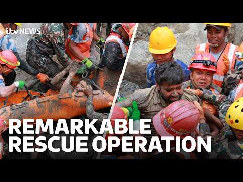 Extraordinary moment two Nepalese workers rescued after nine days trapped