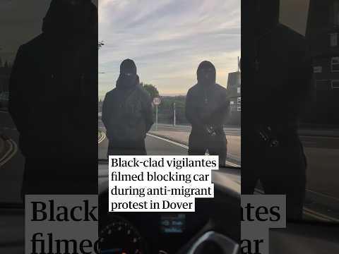Black-clad vigilantes filmed blocking cars during anti-migrant protest in Dover