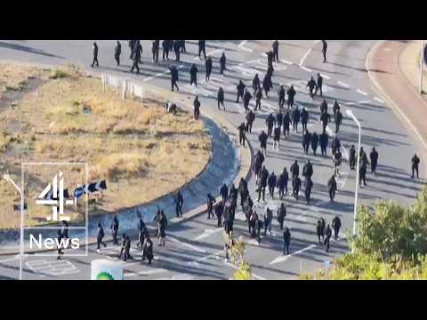 UK government condemns anti-migrant protests