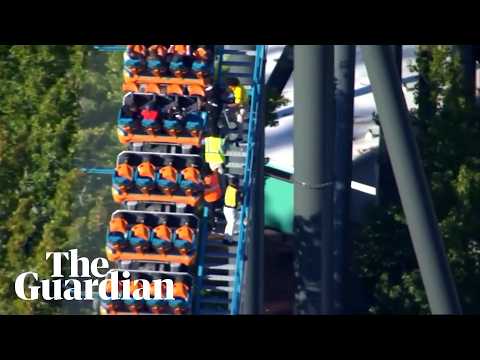 Aerial footage shows people rescued from rollercoaster after fatal incident at Six Flags