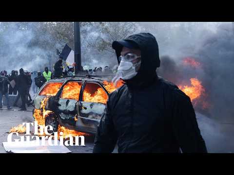 Police clash with students and workers protesting in Paris