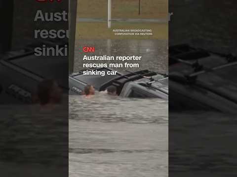 Australian reporter rescues man from sinking car
