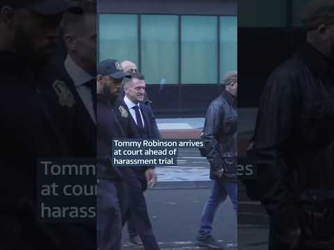 Tommy Robinson arrives at court ahead of harassment trial
