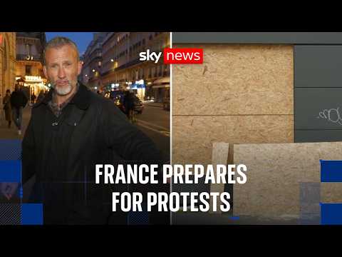 Security forces prepare for protests in France as shops are boarded up