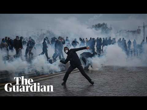 Police and protesters exchange teargas and fireworks in demonstrations across France
