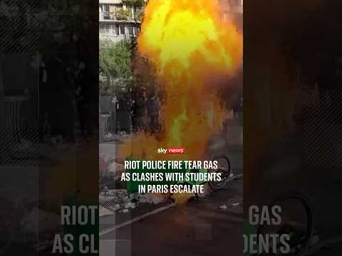 Riot police fire tear gas as clashes with students in Paris escalate