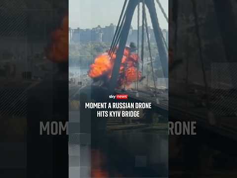 Moment a Russian drone hits Kyiv bridge