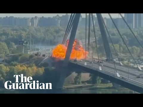 Russian drone hits key bridge in Kyiv on German chancellor’s visit