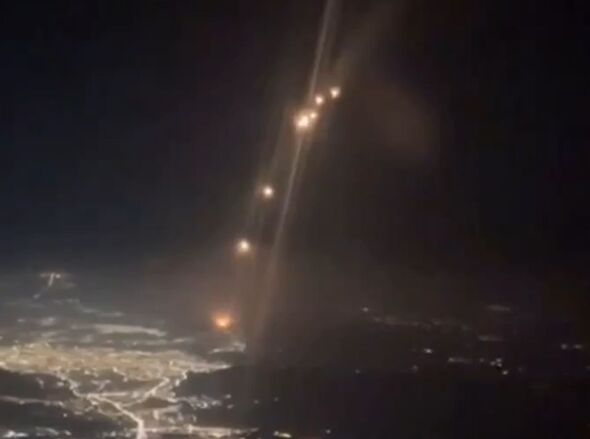 Horror moment Iranian missiles spotted raining down from passenger plane window