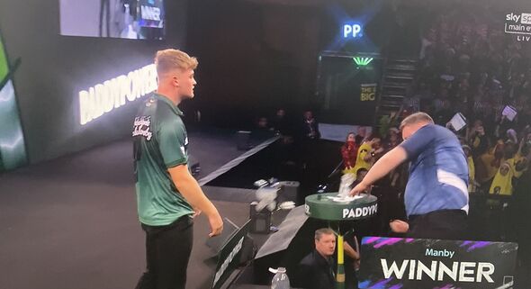 World Darts Championship star uppercuts table three times in furious outburst as fans boo