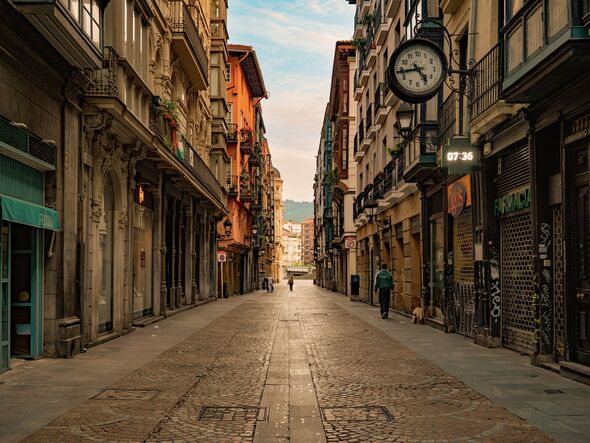 Blood-stained woman ‘had hacked off partner’s genitals before murdering him’