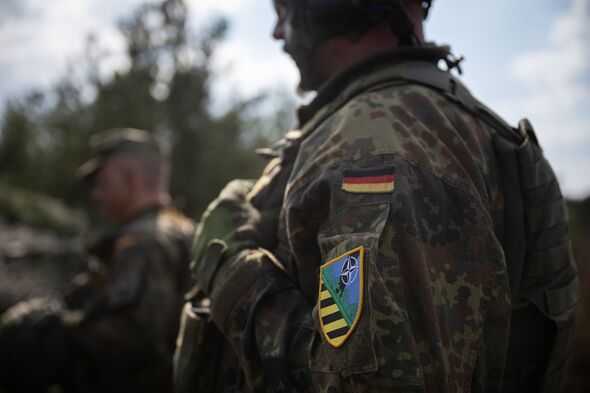 Germany forces all men to seek permission to leave in new conscription laws
