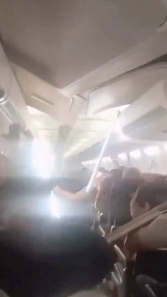 Terrifying moment plane’s ceiling collapses as passengers scream in horror