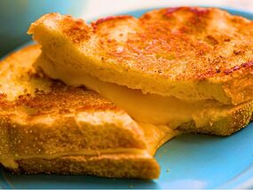 Cheese toasties are crispier and melt better if you swap butter for a tastier ingredient