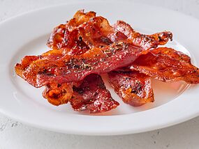 Stop cooking bacon in a frying pan—butcher shares easier hack for crispy results